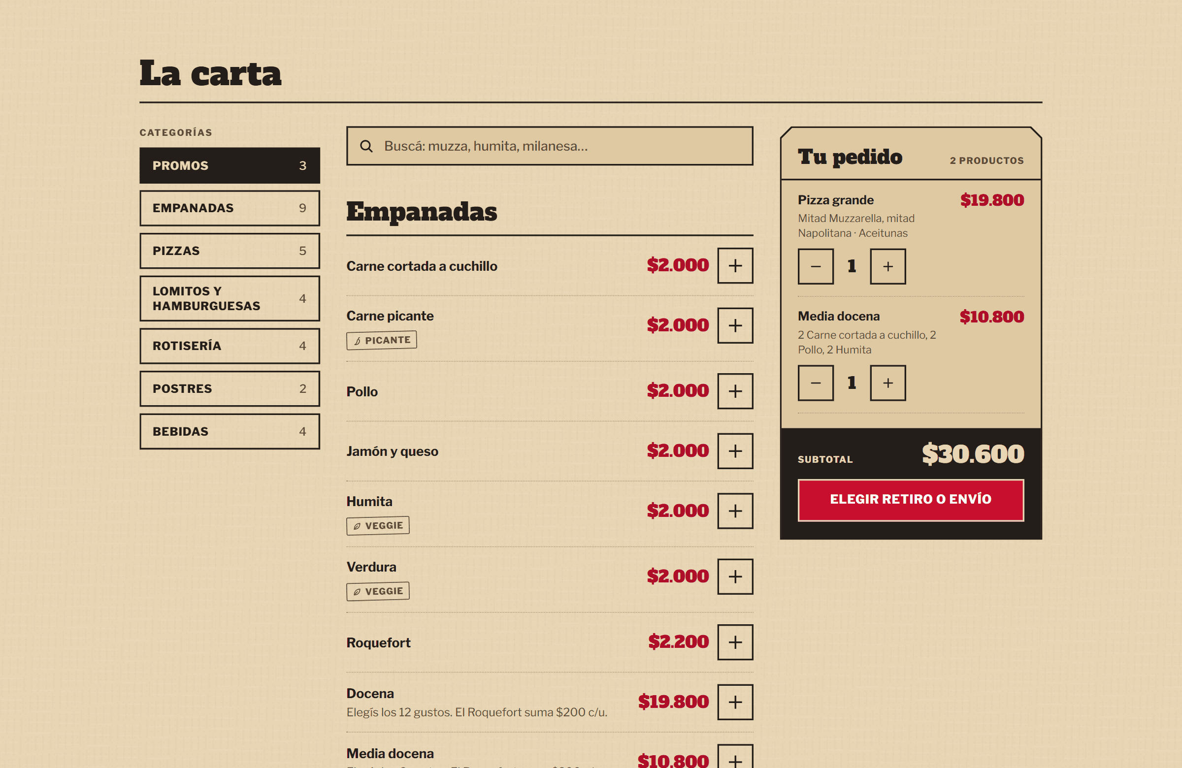 La web de un local de comida con el diseño Cartón: la carta en papel madera, con las categorías a la izquierda y las empanadas con su precio y un botón para sumarlas, y al costado «Tu pedido» con 2 productos, $30.600 y un botón que dice «Elegir retiro o envío».